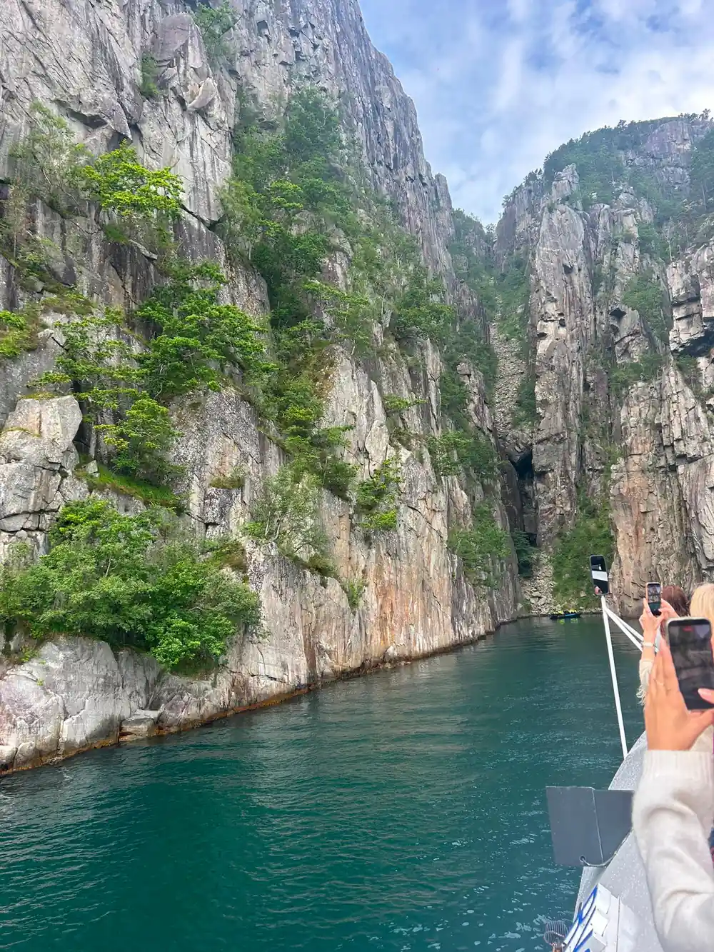 Steep rocky canyon walls with narrow water passage